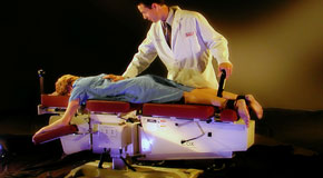 This is a picture of Cox Technic chiropratic spinal manipulation as performed at Vancouver Disc Centers.